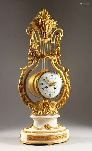 A GOOD LOUIS XVI ORMOLU AND WHITE MARBLE LYRE SHAPED CLOCK, with eight-day drum movement, sunburst