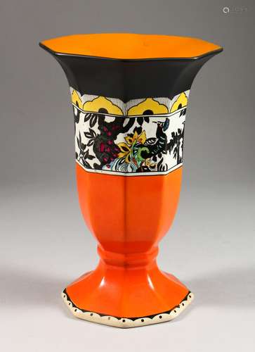 A RIALTO WARE ART DECO TRUMPET SHAPED PORCELAIN VASE, decorated with a band of peacocks. 10ins