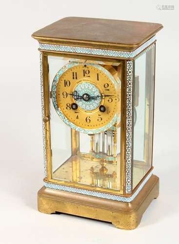 A CLOISONNE DECORATED BRASS FOUR GLASS CLOCK, eight-day movement, striking on a gong. 9.25ins high.