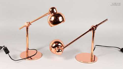 A PAIR OF COPPER ANGLEPOISE DESK LAMPS.