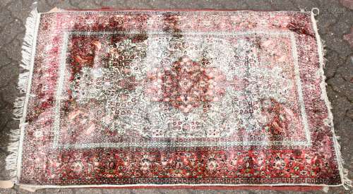 A 20TH CENTURY PART SILK PERSIAN RUG, beige ground with allover stylised floral decoration within