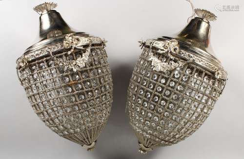 A PAIR OF SILVER PLATED AND CUT GLASS PINEAPPLE SHAPED CEILING LIGHTS. 22ins high.