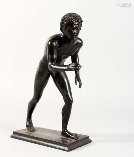 AFTER THE ANTIQUE, a good small cast bronze figure of a young naked athlete. 8.5ins high.