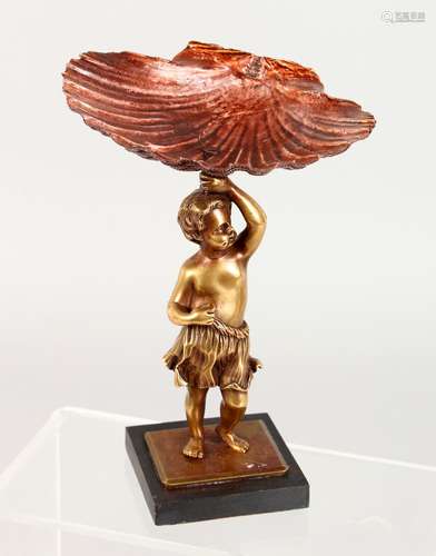 A SMALL 19TH CENTURY BRONZE MODEL OF A CHERUB, holding a shell above its head. 7.5ins high.