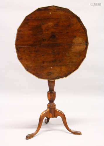 AN 18TH CENTURY YEW WOOD TILT TOP TRIPOD TABLE, with a shaped top, later edged, on a turned column