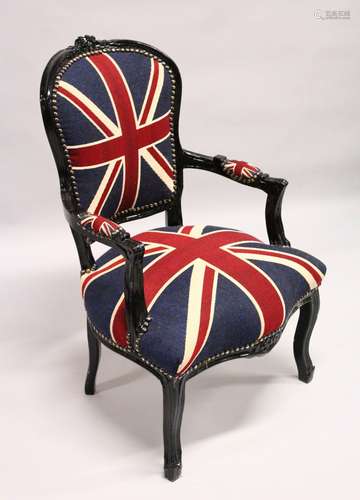 A SMALL EBONISED FRAMED FRENCH STYLE ARMCHAIR, upholstered in a Union Jack material.