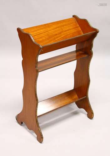 A LATE 19TH CENTURY SATINWOOD BOOK TROUGH, the two book troughs united by a shelf, with shaped sides