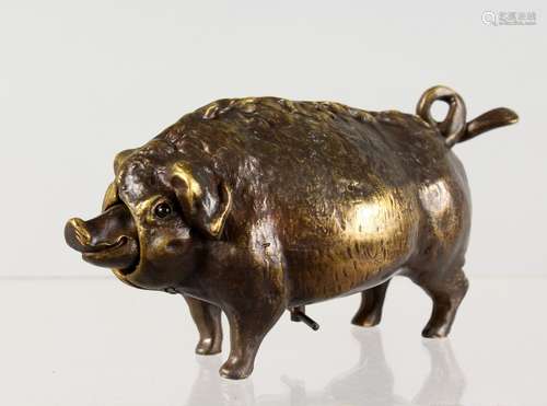 A NOVELTY BRONZE PIG BELL. 6.5ins long.