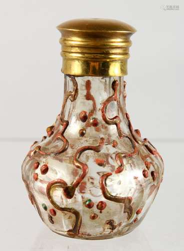 A SMALL BULBOUS SCENT BOTTLE with gilt stopper. 3ins high.