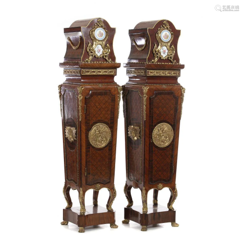 Pair of Louis XVI style column cabinets