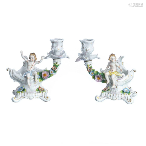 Pair of figurative candlesticks in German po…