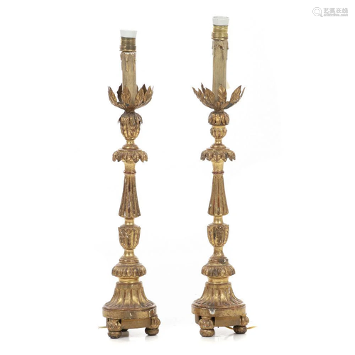 Pair of carved torches / lamps