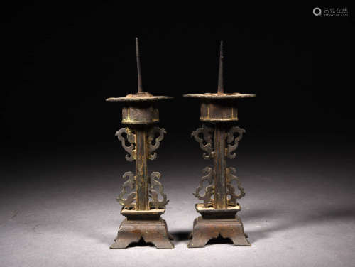 A Pair of Chinese Copper Candlesticks