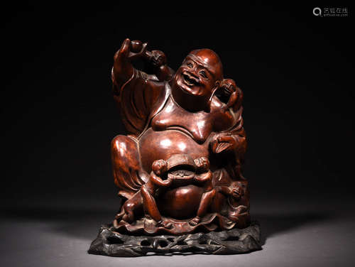 A Chinese Carved Longan Wood Statue of Maitreya