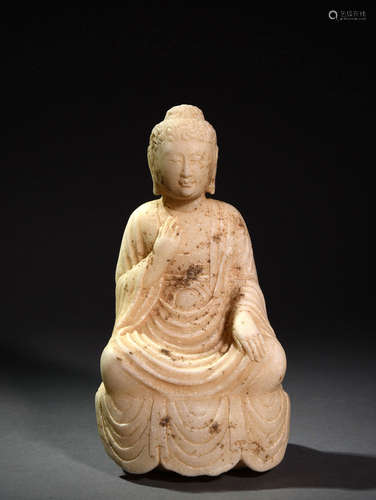 A Chinese Carved White Jade Buddha Statue