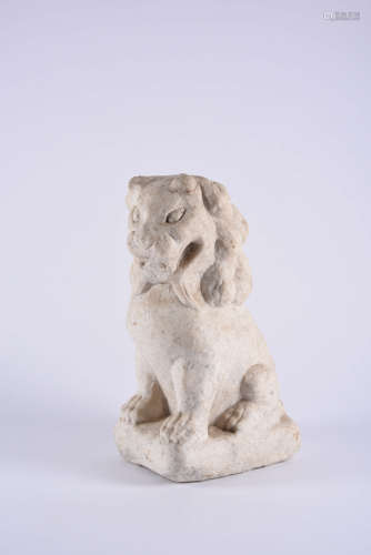A Chinese Carved White Jade Lion Ornament