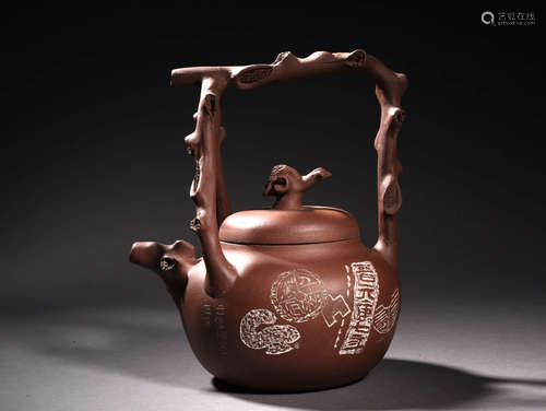 A Chinese Purple Sand Handled Pot