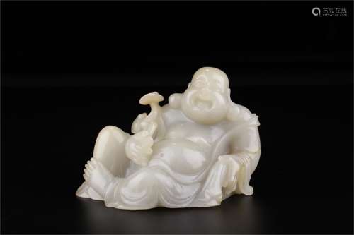 A Chinese Carved Jade Figure of Buddha