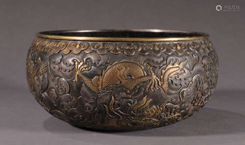 A SILVER BOWL CARVED WITH DRAGON PATTERN