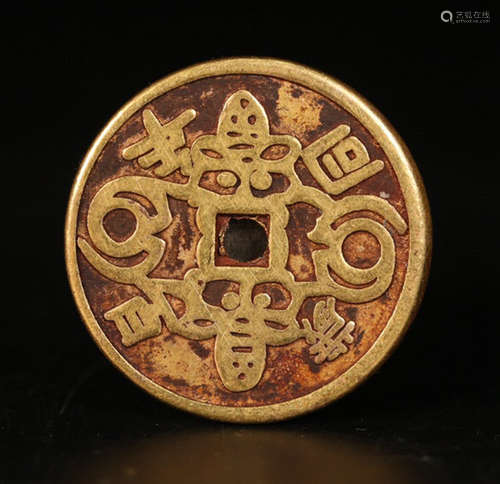 A GOLD COIN WITH AUSPICIOUS PATTERN