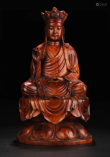 A HUANGHUALI WOOD CARVED KSITIGARBHA