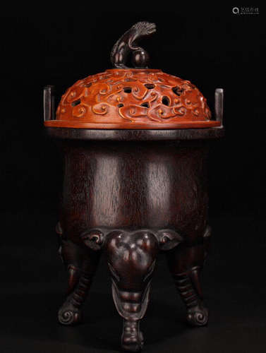 A ZITAN WOOD TRIPOD CENSER CARVED WIH LION