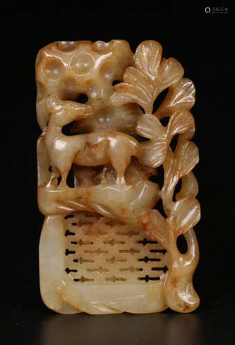 A HETIAN JADE PENDANT CARVED WITH DEER