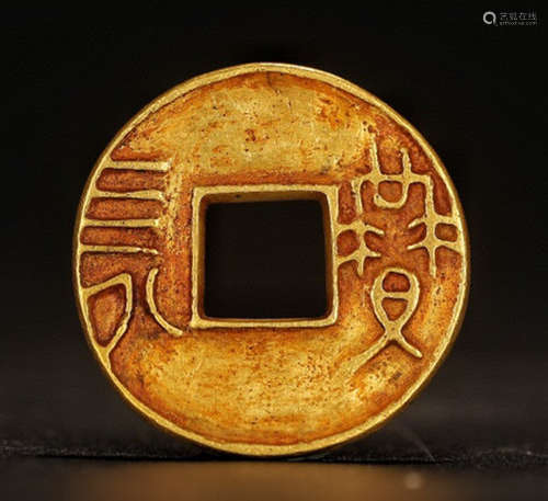 A GOLD COIN