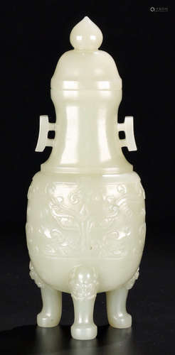 A HETIAN JADE VASE CARVED WITH TAOTIE BEAST