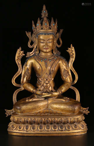 A GILT BRONZE LONGEVITY BUDDHA STATUE