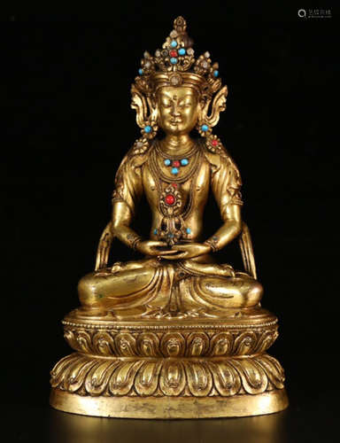 A GILT BRONZE LONGEVITY BUDDHA STATUE