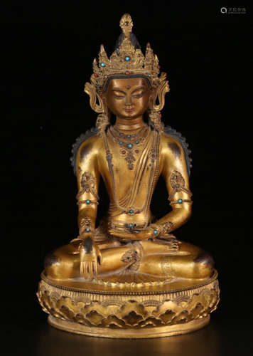 A GILT BRONZE LONGEVITY BUDDHA STATUE