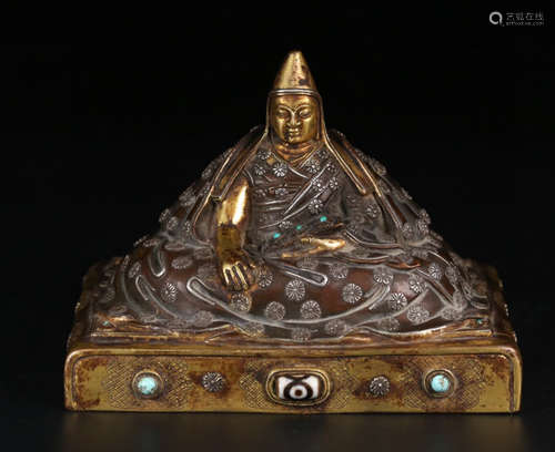 A GILT BRONZE ZONGKABA STATUE