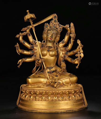 A GILT BRONZE BODHISATTVA TARA WITH MULTIPLE HANDS