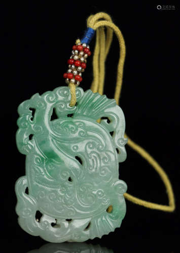 A JADEITE TABLET CARVED WITH DRAGON PATTERN