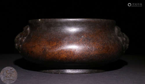 A COPPER CENSER CARVED WITH BEAST