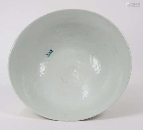 A BLUE AND WHITE BOWL WITH PATTERN