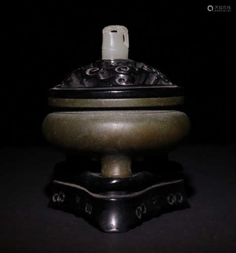 A COPPER CARVED TRIPOD CENSER