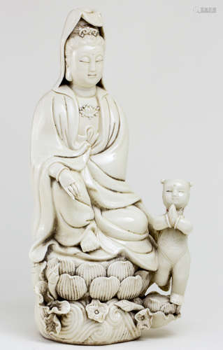 A DEHUA POCELAIN FIGURE OF GUANYIN AND CHILD