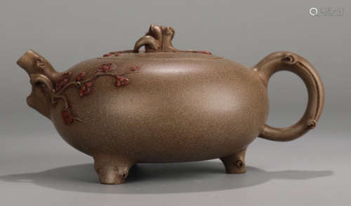 A ZISHA POT CARVED WITH PLUM FLOWER PATTERN