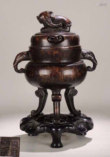 A COPPER CARVED CENSER WITH ELEPHANT EAR