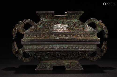 A BRONZE CENSER WITH PATTERN