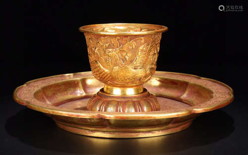 A GILT BRONZE CUP CARVED PHOENIX AND FLOWER