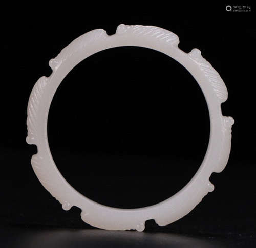 A HETIAN JADE BANGLE WITH PATTERN