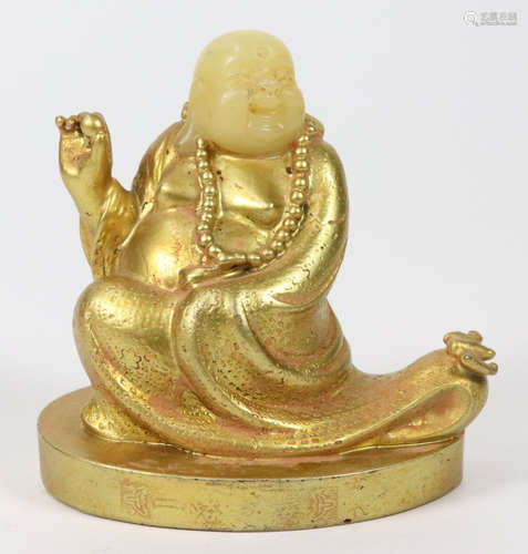 A SOAPSTONE MAITREYA BUDDHA