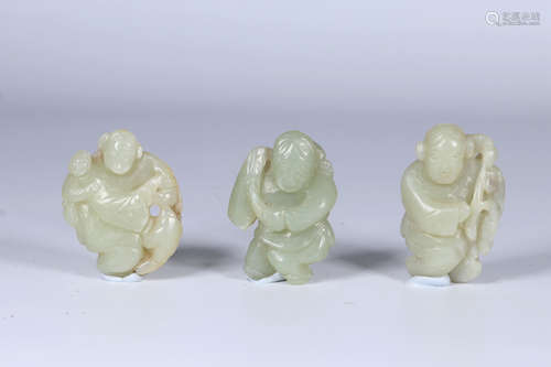 THREE JADE CARVED 'PEOPLE' FIGURES