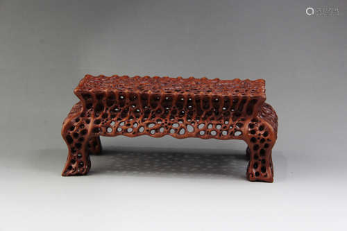 A CHINESE CARVED HOLLOW OUT BOXWOOD INK BED