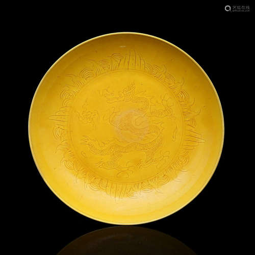 A Chinese Yellow Glazed Dragon Carved Porcelain Plate