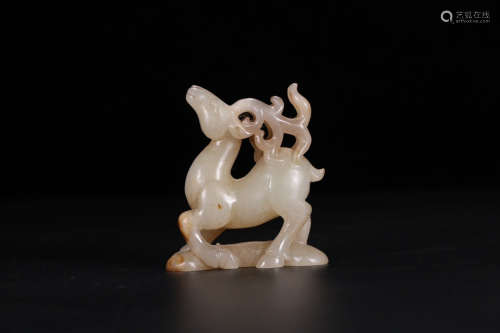 A Chinese Carved Hetian Jade Deer Ornament