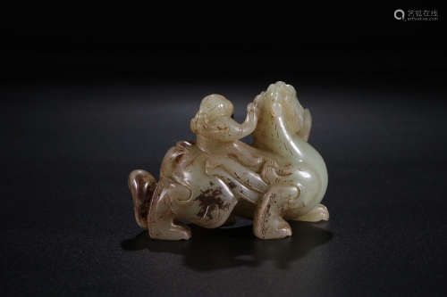 A Chinese Carved Hetian Jade Beast Ornament